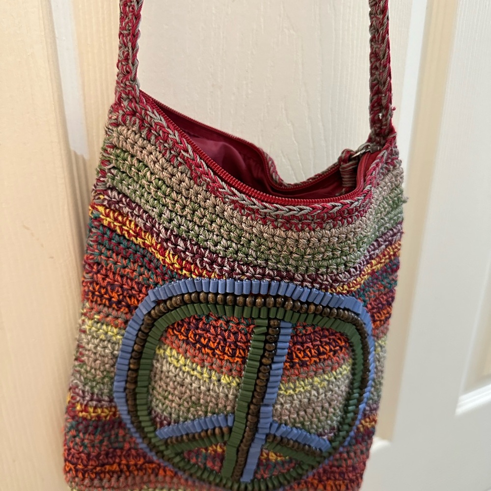 The Sak crotchet/beaded peace sign purse